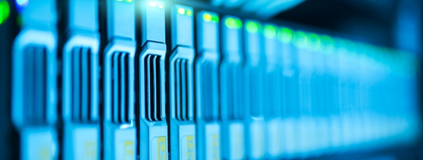 Detailed image of a server rack with glowing lights in a modern data center.